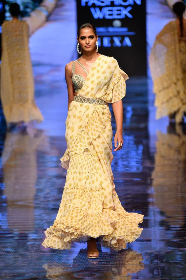 Arpita Mehta yellow pint ruffle saree set