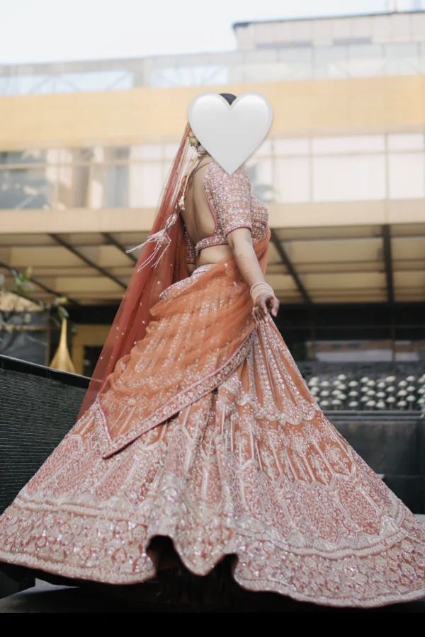 Bidani rust orange lehenga