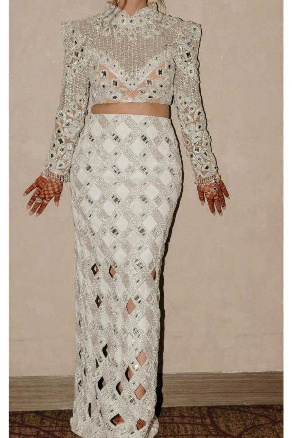Manish Malhotra White embellished skirt with a heavy blouse - Image 2
