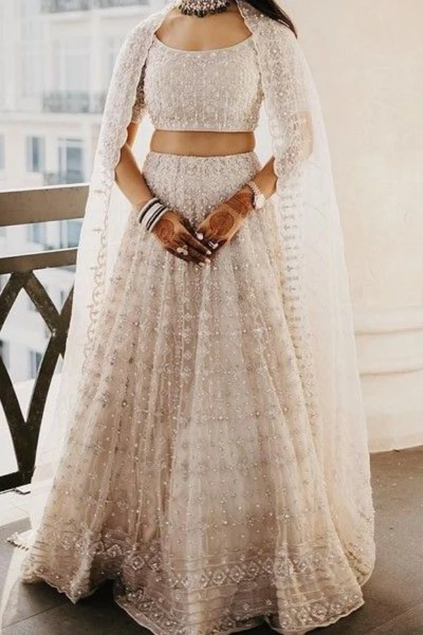 Ridhi mehra Ivory lehenga