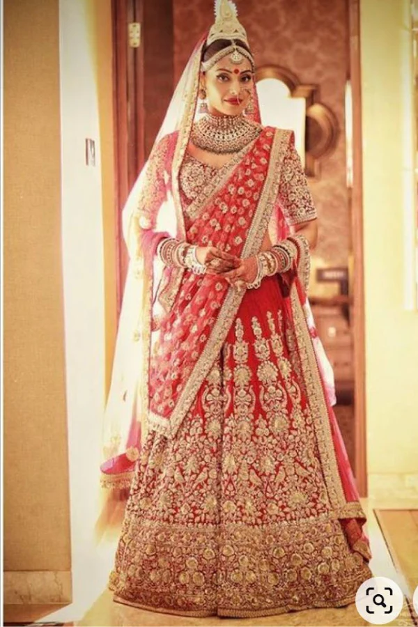 Sabyasachi dark red embroidered lehenga set