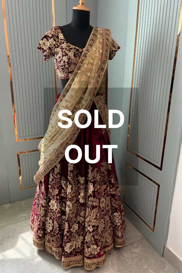 Sabyasachi maroon velvet lehenga set