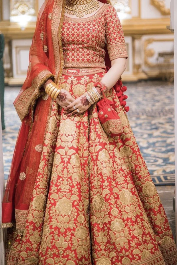 Sabyasachi red bridal embroidered lehenga - Image 3