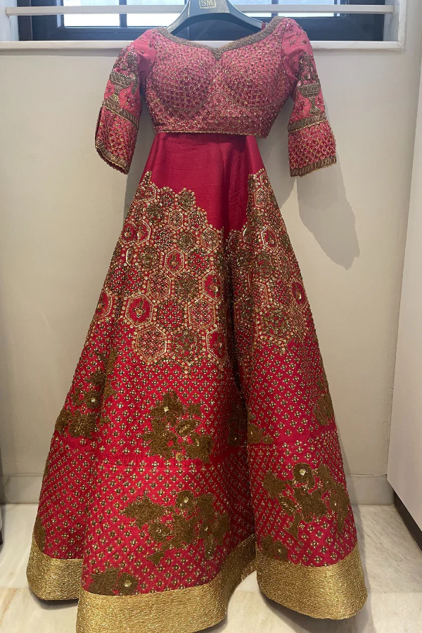 sulakshana monga red embroidered lehenga