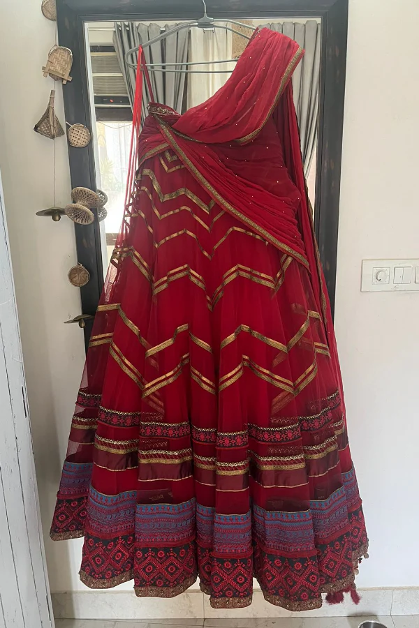 Tarun tahiliani red lehenga saree