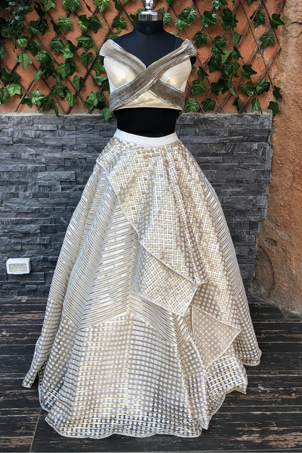 White and gold lehenga set